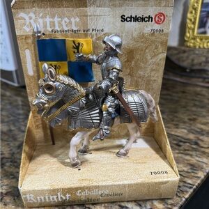 NWT Schleich action figure💙💛